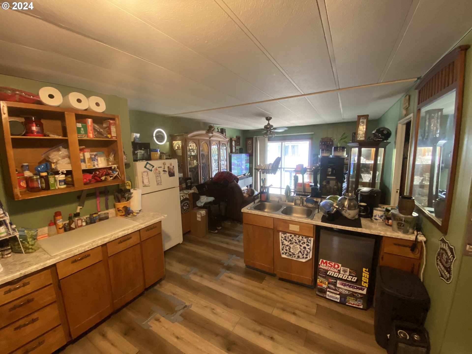 237 Waite Street Eugene, OR 97402 - Photo 8 of 17 a room with lots of wooden furniture and a mirror