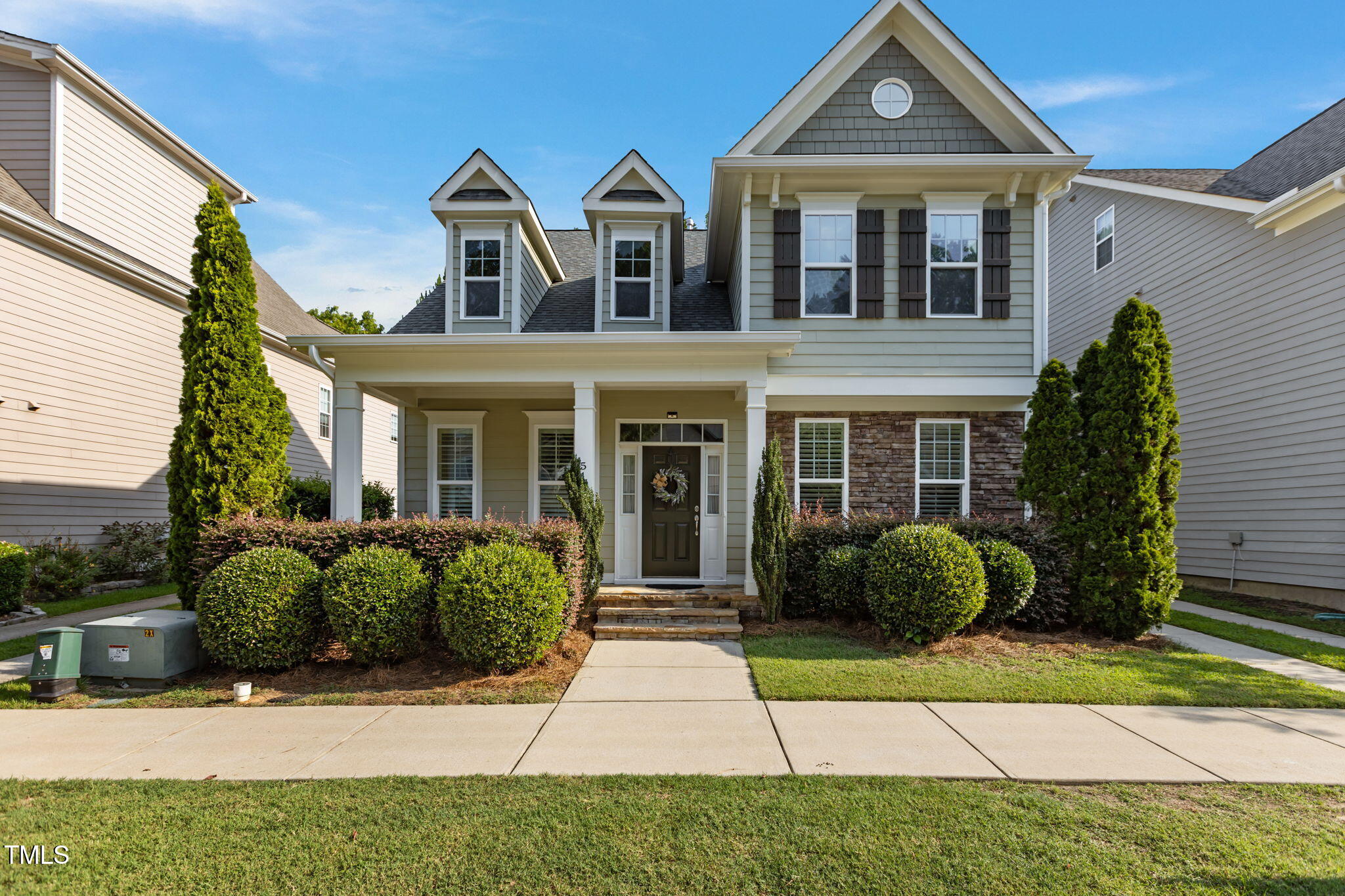 511 Mill Hopper Lane Apex, NC 27502 - Photo 2 of 53 a front view of a house with yard