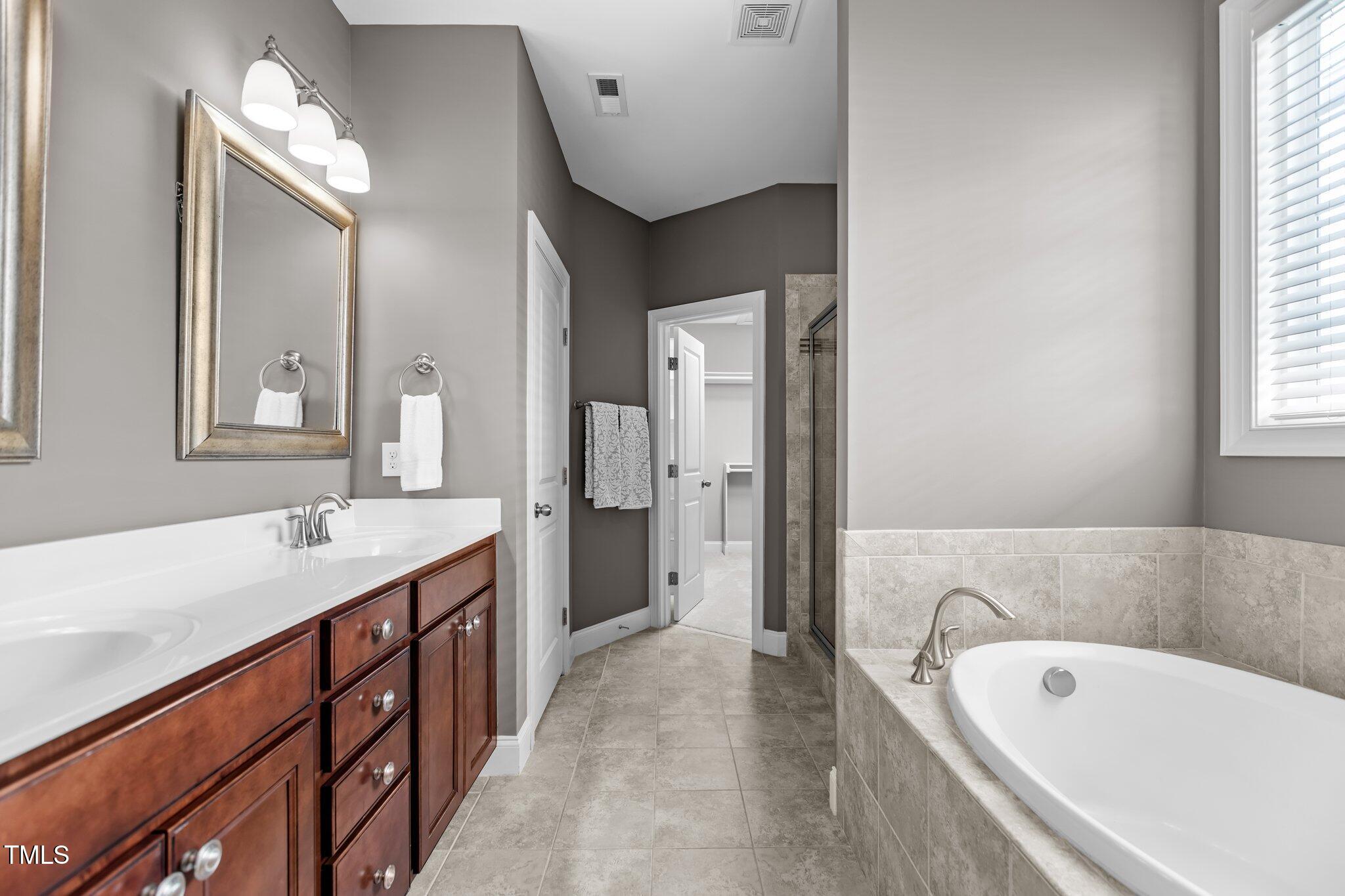 511 Mill Hopper Lane Apex, NC 27502 - Photo 23 of 53 Primary Bath