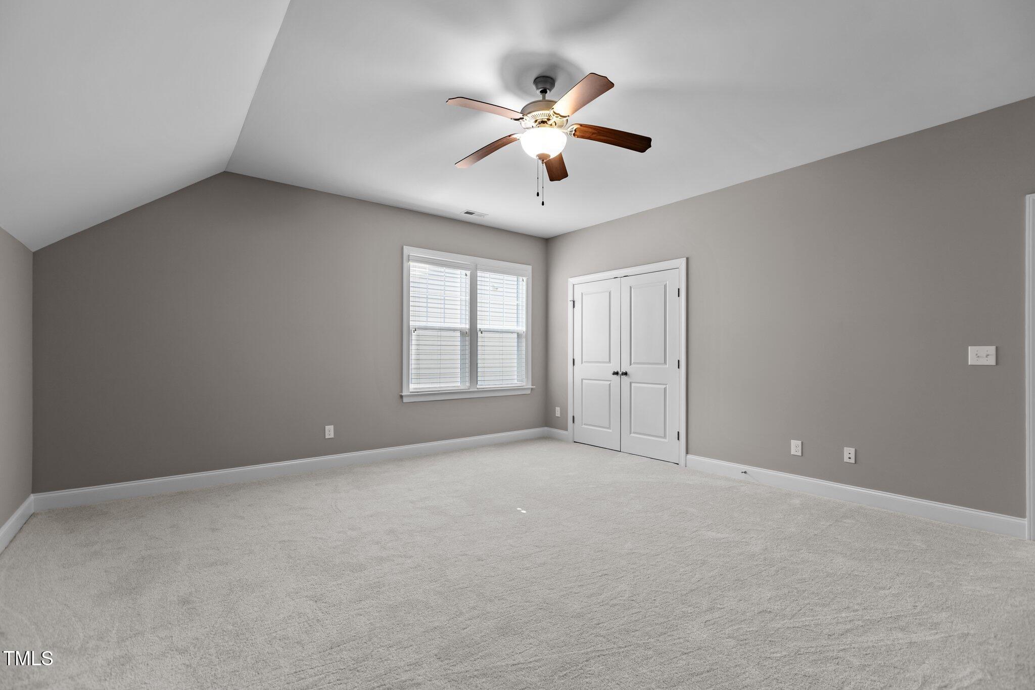 511 Mill Hopper Lane Apex, NC 27502 - Photo 34 of 53 a view of an empty room with a window