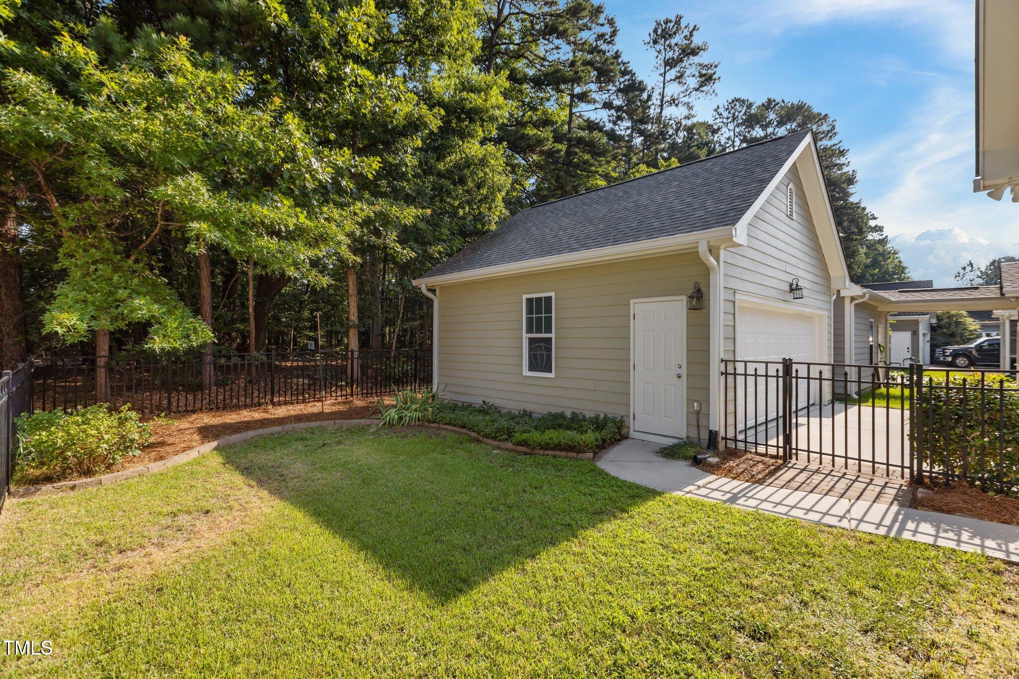 511 Mill Hopper Lane Apex, NC 27502 - Photo 44 of 53 front view of a house with a yard