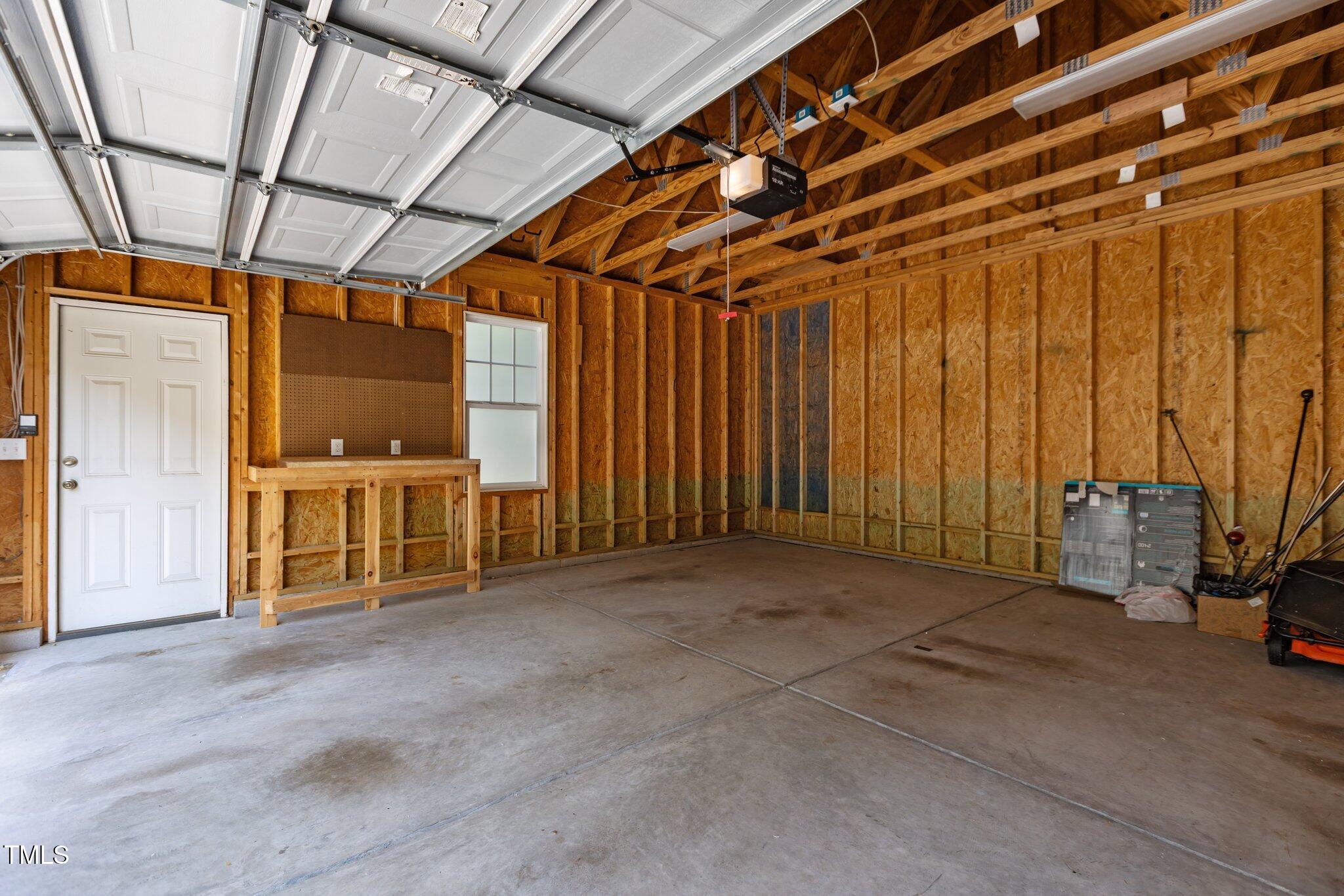 511 Mill Hopper Lane Apex, NC 27502 - Photo 47 of 53 a view of an empty room with a window
