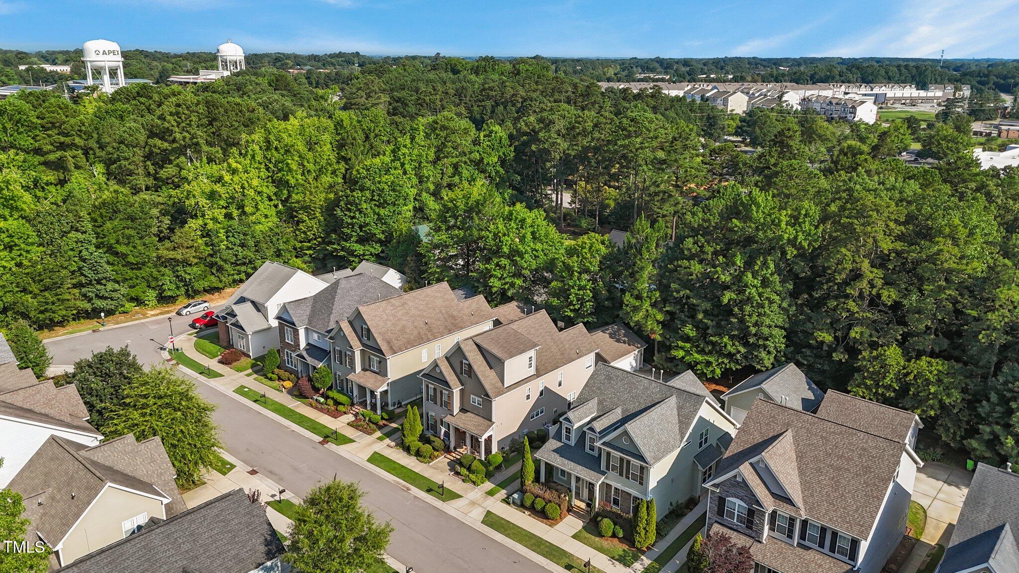 511 Mill Hopper Lane Apex, NC 27502 - Photo 50 of 53 an aerial view of a house with a garden