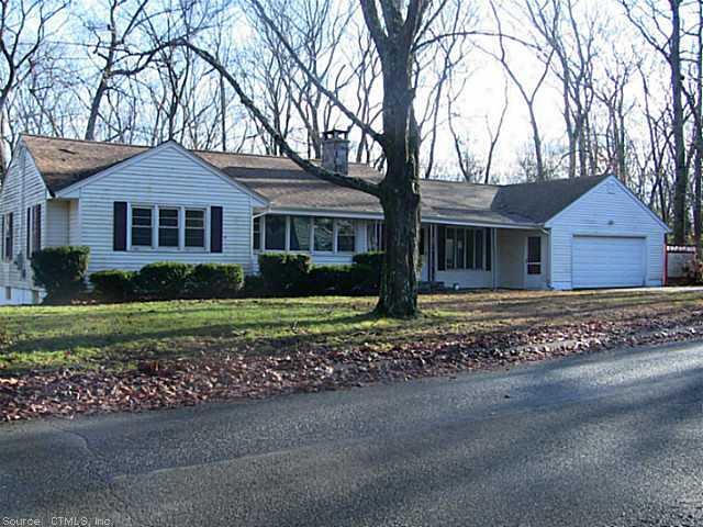 117 Colburn Road Stafford, CT 06076 - Photo 1 of 1 front view of a house with a yard
