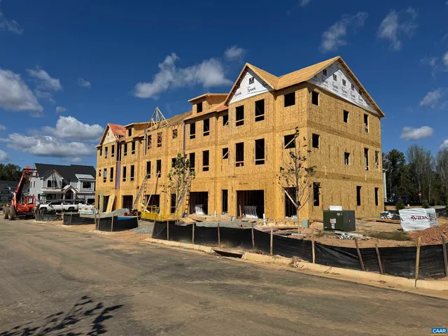 a view of a large building with a street