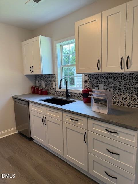 415 Sowell Street Durham, NC 27701 - Photo 5 of 17 a kitchen with white cabinets sink and window