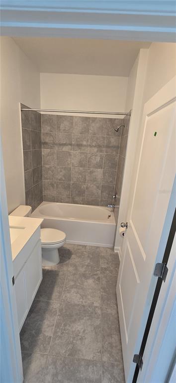 1029 Holden Way Eagle Lake, FL 33839 - Photo 15 of 22 a bathroom with a bathtub and toilet