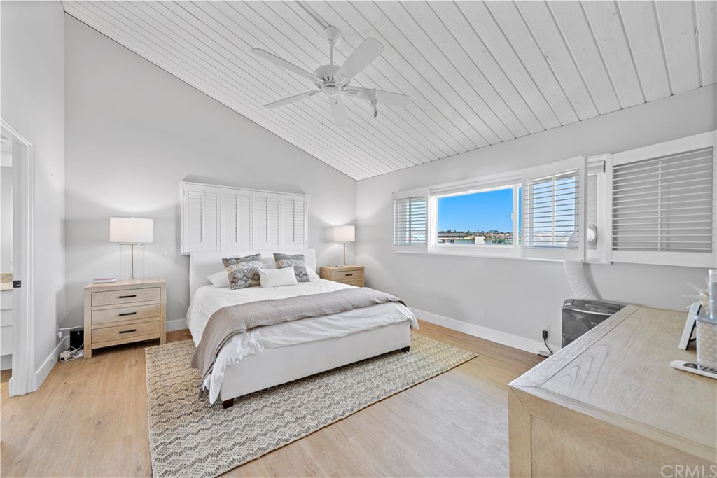 317 Monarch Bay Drive Dana Point, CA 92629 - Photo 11 of 26 a bedroom with a bed and a dresser