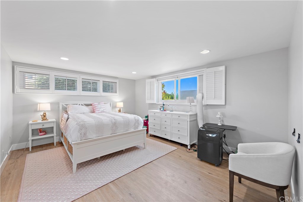 317 Monarch Bay Drive Dana Point, CA 92629 - Photo 14 of 26 a bedroom with a bed and a dresser