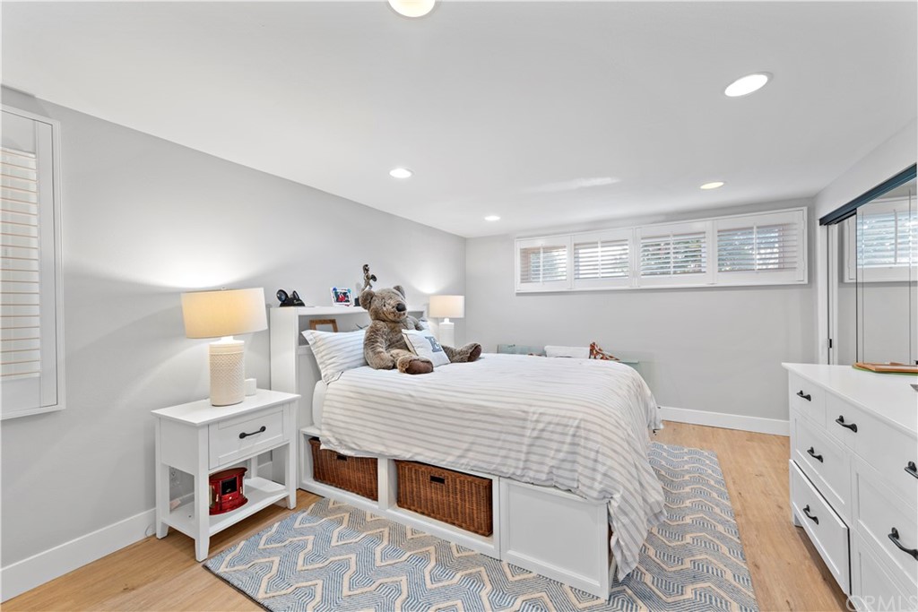 317 Monarch Bay Drive Dana Point, CA 92629 - Photo 15 of 26 a bed room with a bed and a dresser