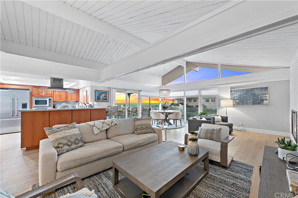 317 Monarch Bay Drive Dana Point, CA 92629 - Photo 18 of 26 a living room with furniture a rug and a ceiling fan