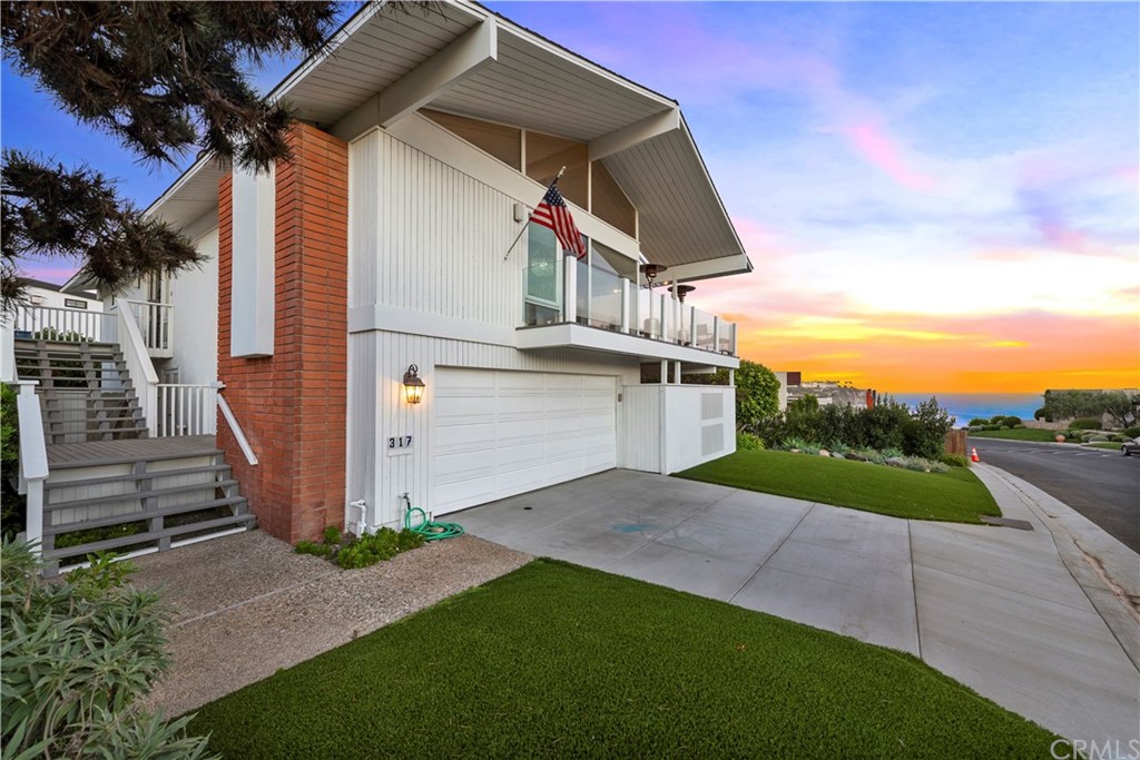 317 Monarch Bay Drive Dana Point, CA 92629 - Photo 20 of 26 a view of a house with a yard