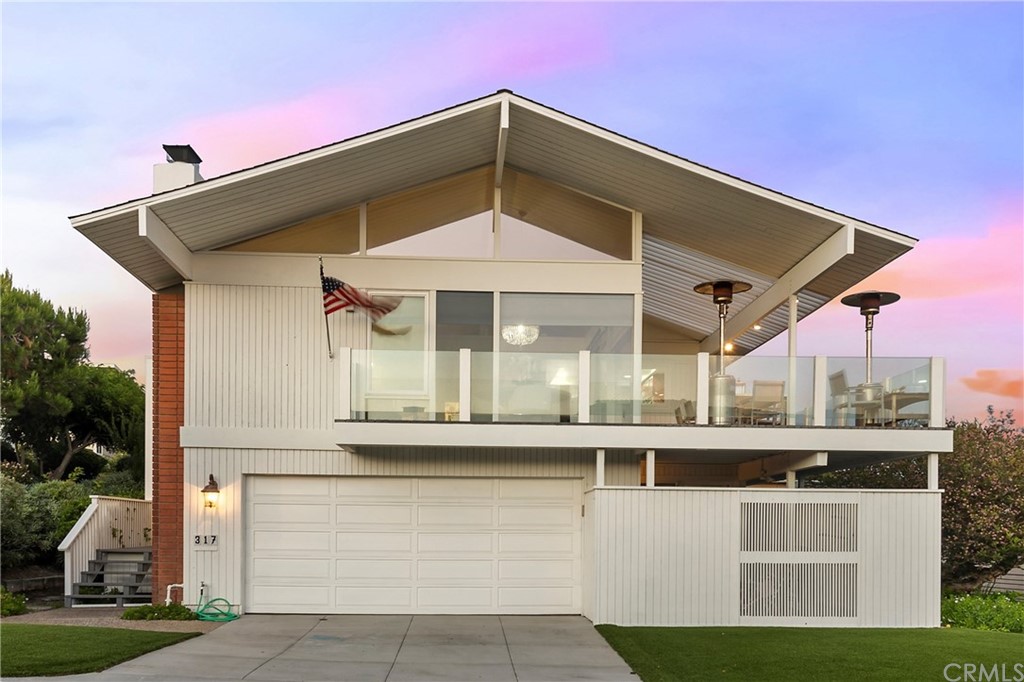 317 Monarch Bay Drive Dana Point, CA 92629 - Photo 24 of 26 a front view of a house with porch