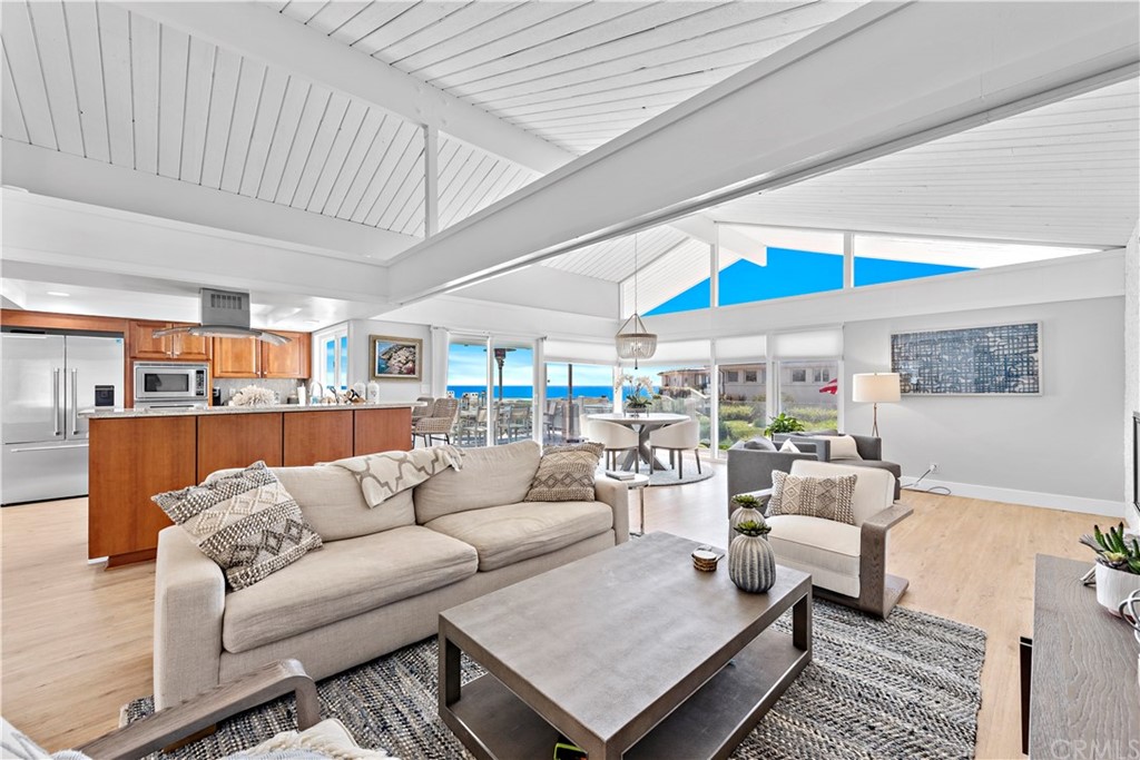 317 Monarch Bay Drive Dana Point, CA 92629 - Photo 8 of 26 a living room with furniture and a table