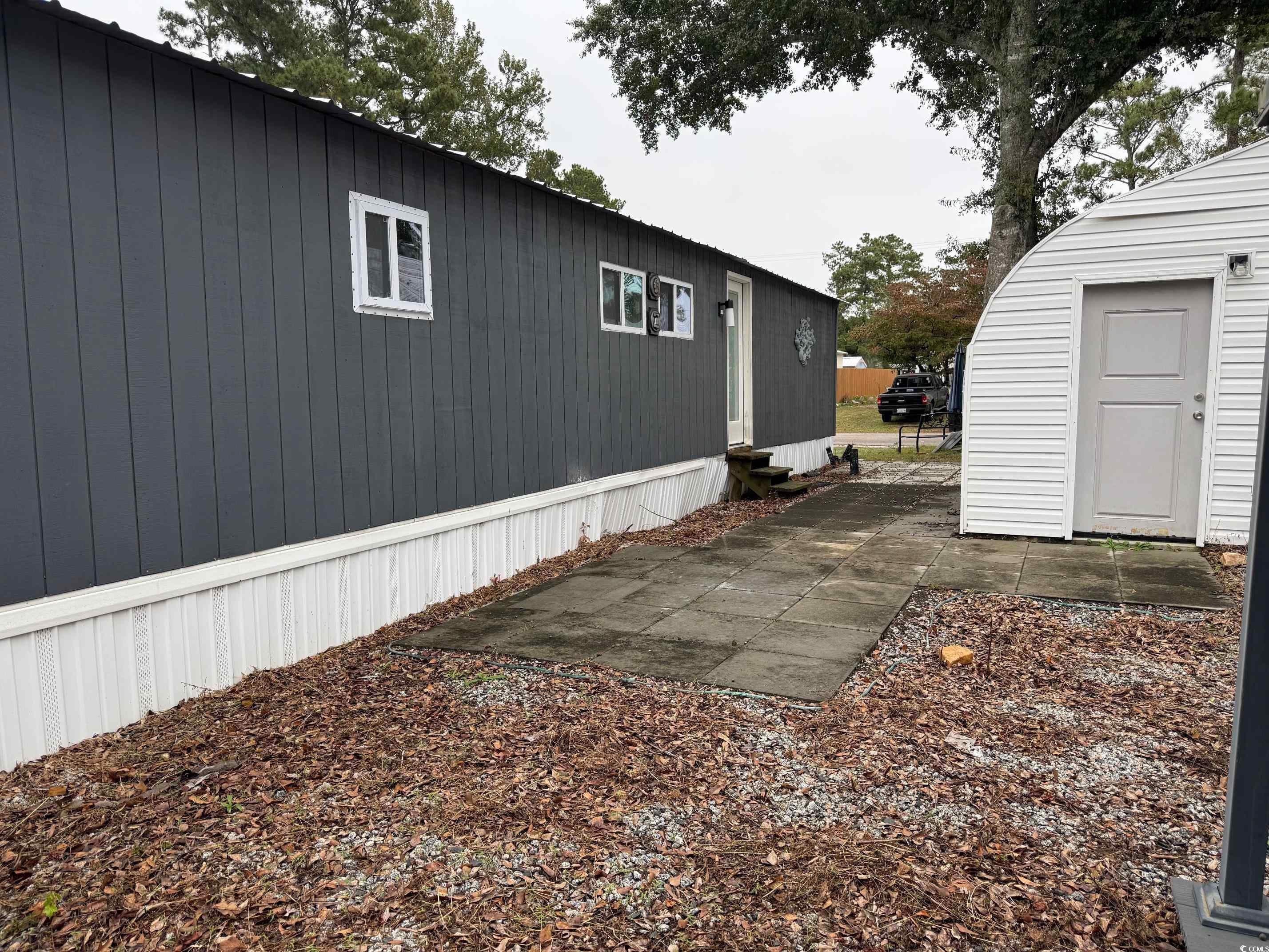 2709 Orion Drive Myrtle Beach, SC 29575 - Photo 6 of 27 View of side of property featuring entry steps