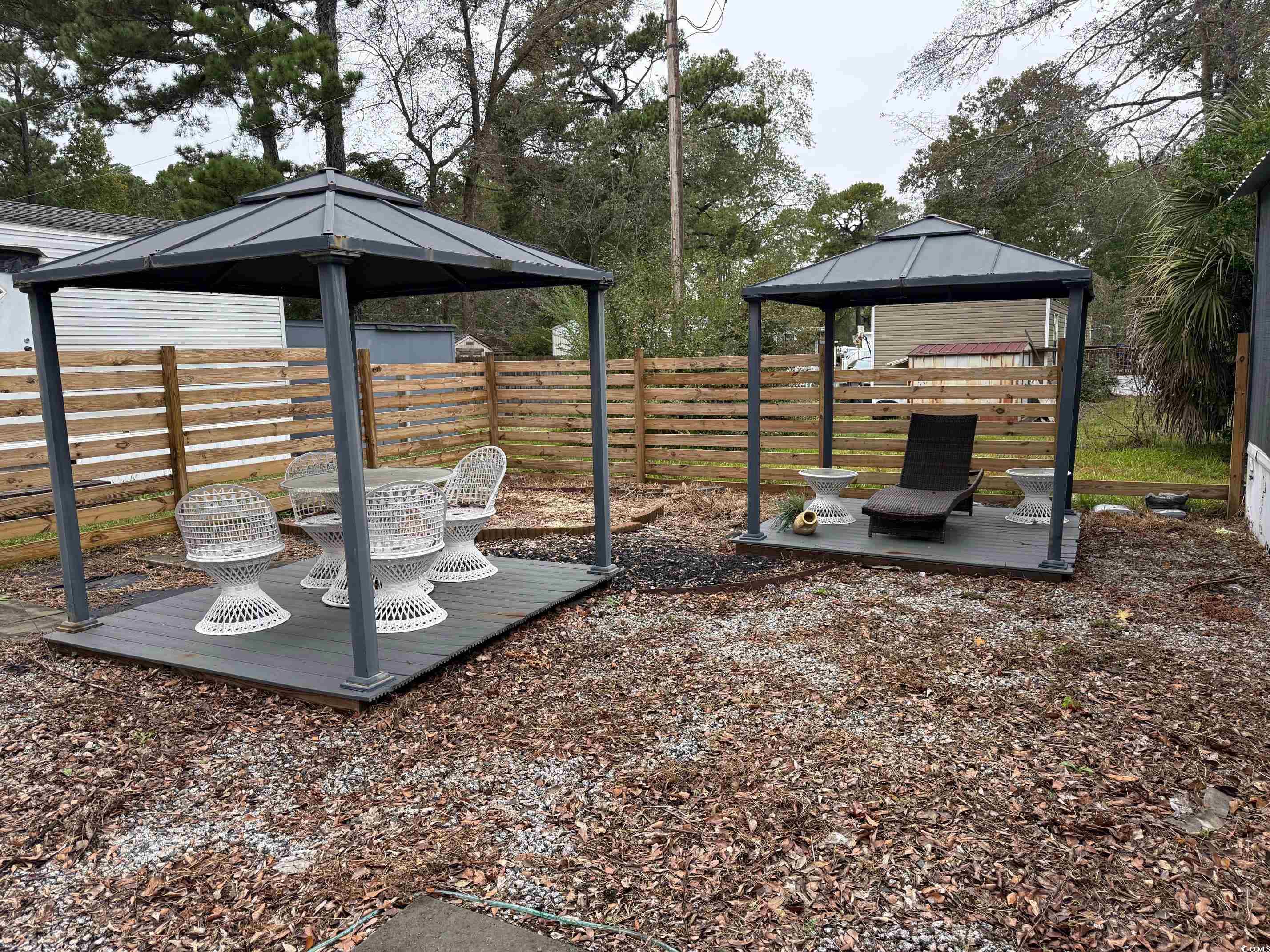 2709 Orion Drive Myrtle Beach, SC 29575 - Photo 10 of 27 View of yard with a gazebo and a patio area