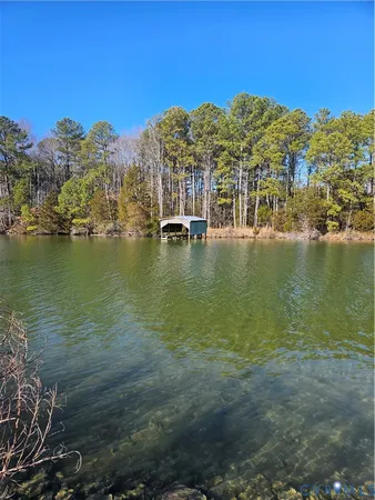 a view of an ocean with a mountain view