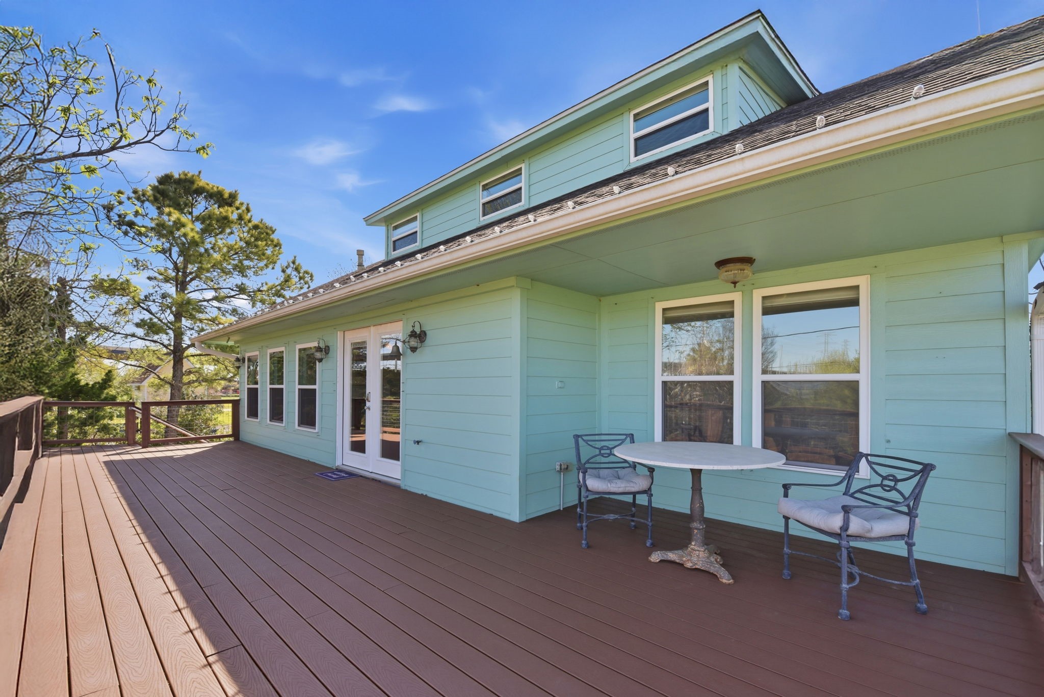 This inviting front porch offers endless possibilities and fills the home with abundant natural light, creating a bright and welcoming atmosphere.