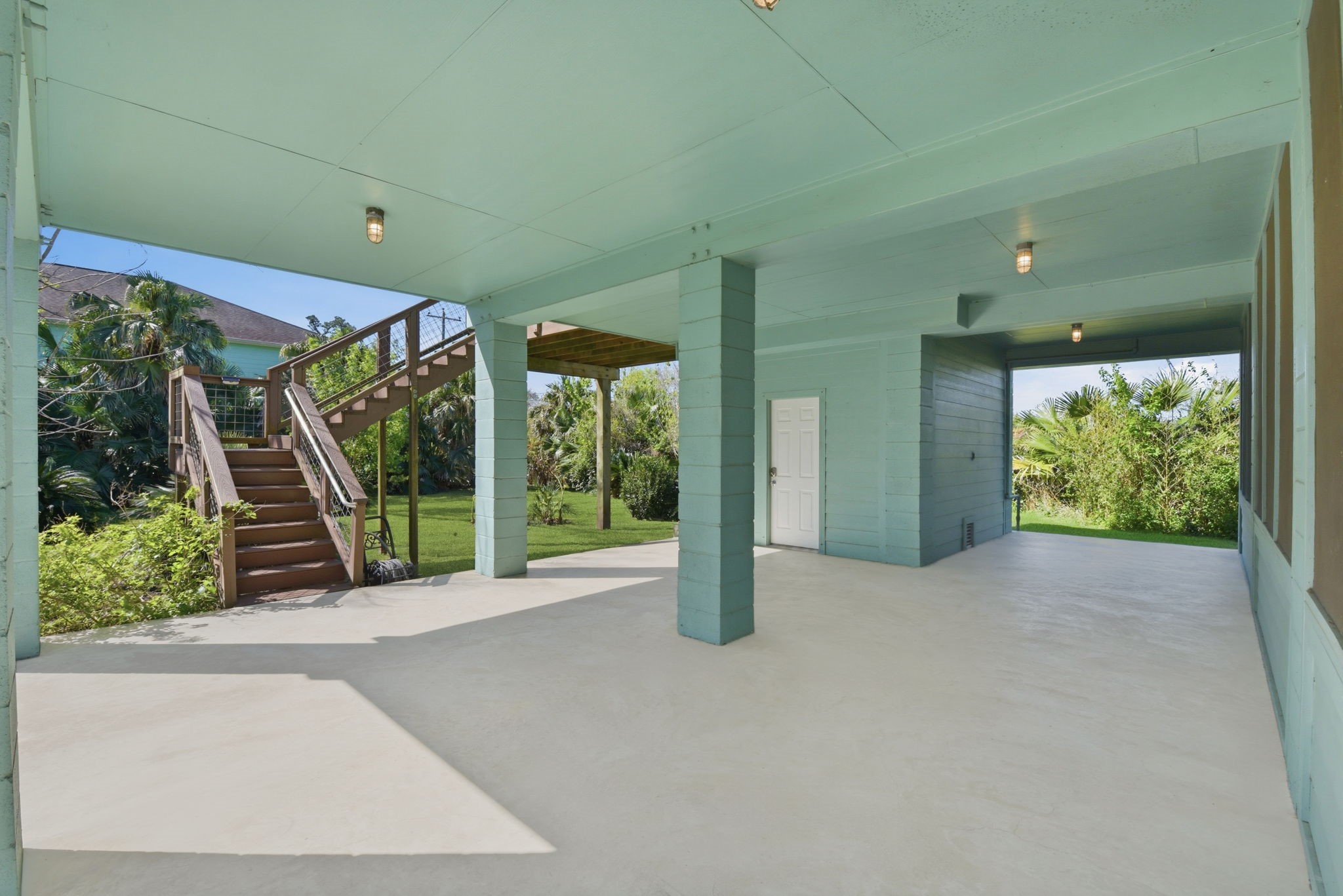 180 Grove Road Kemah, TX 77565 - Photo 25 of 30 Below the home has a wonderful living space that has endless possibilities.