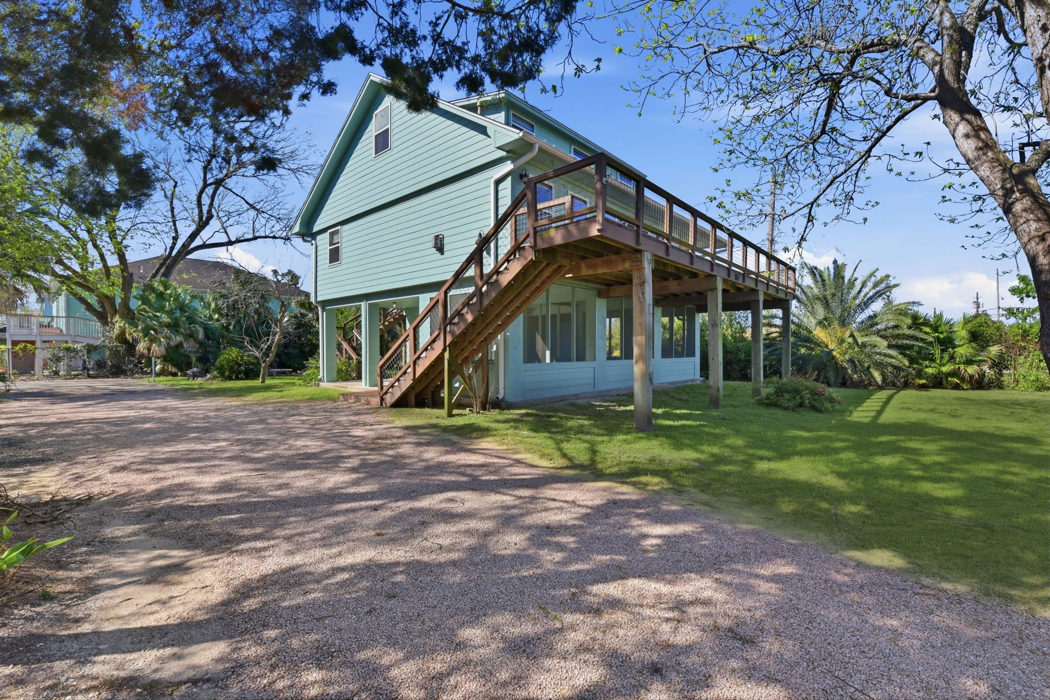 180 Grove Road Kemah, TX 77565 - Photo 6 of 30 Discover the charm of this home with its expansive yard, perfect for outdoor living and endless possibilities.