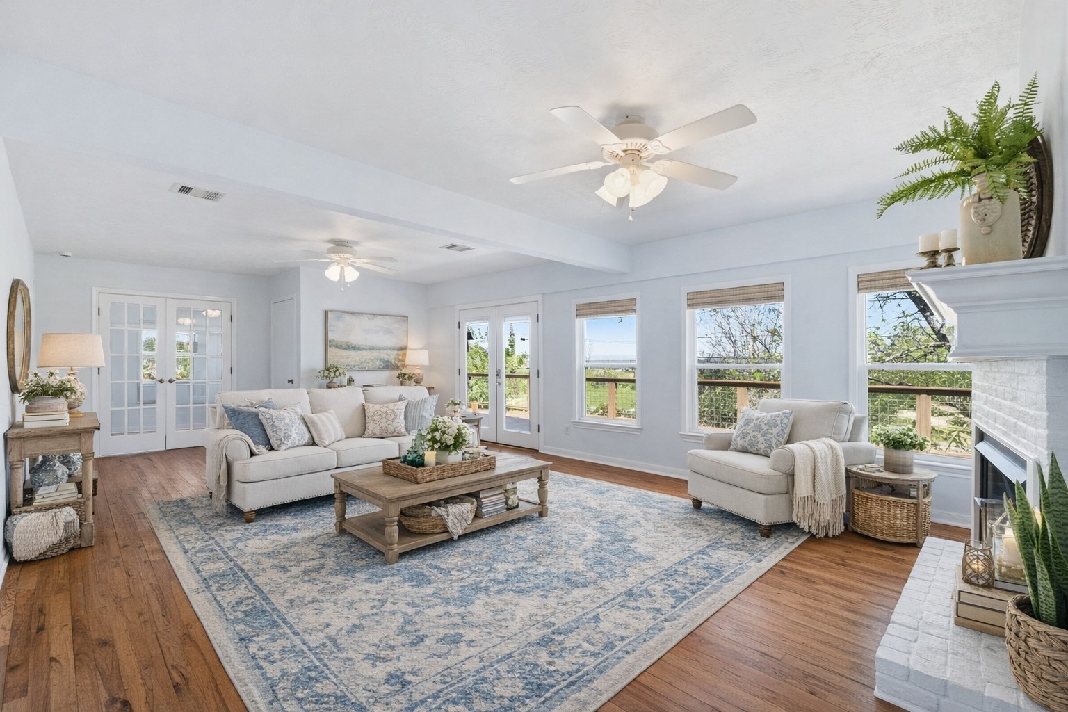 180 Grove Road Kemah, TX 77565 - Photo 7 of 30 Step into a spacious, sunlit living room that welcomes you with warmth and elegance, perfect for creating cherished memories.