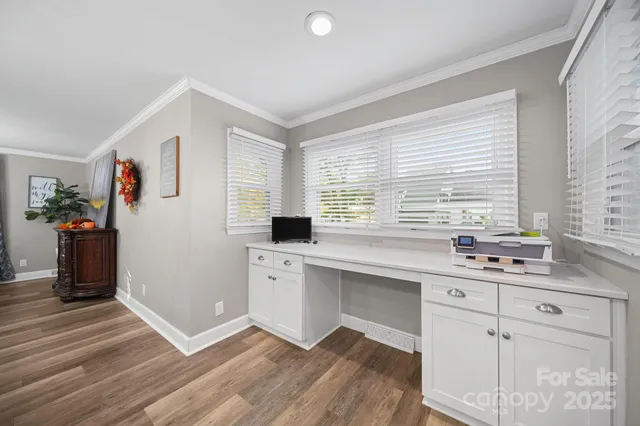 a bathroom with a sink a vanity and a mirror