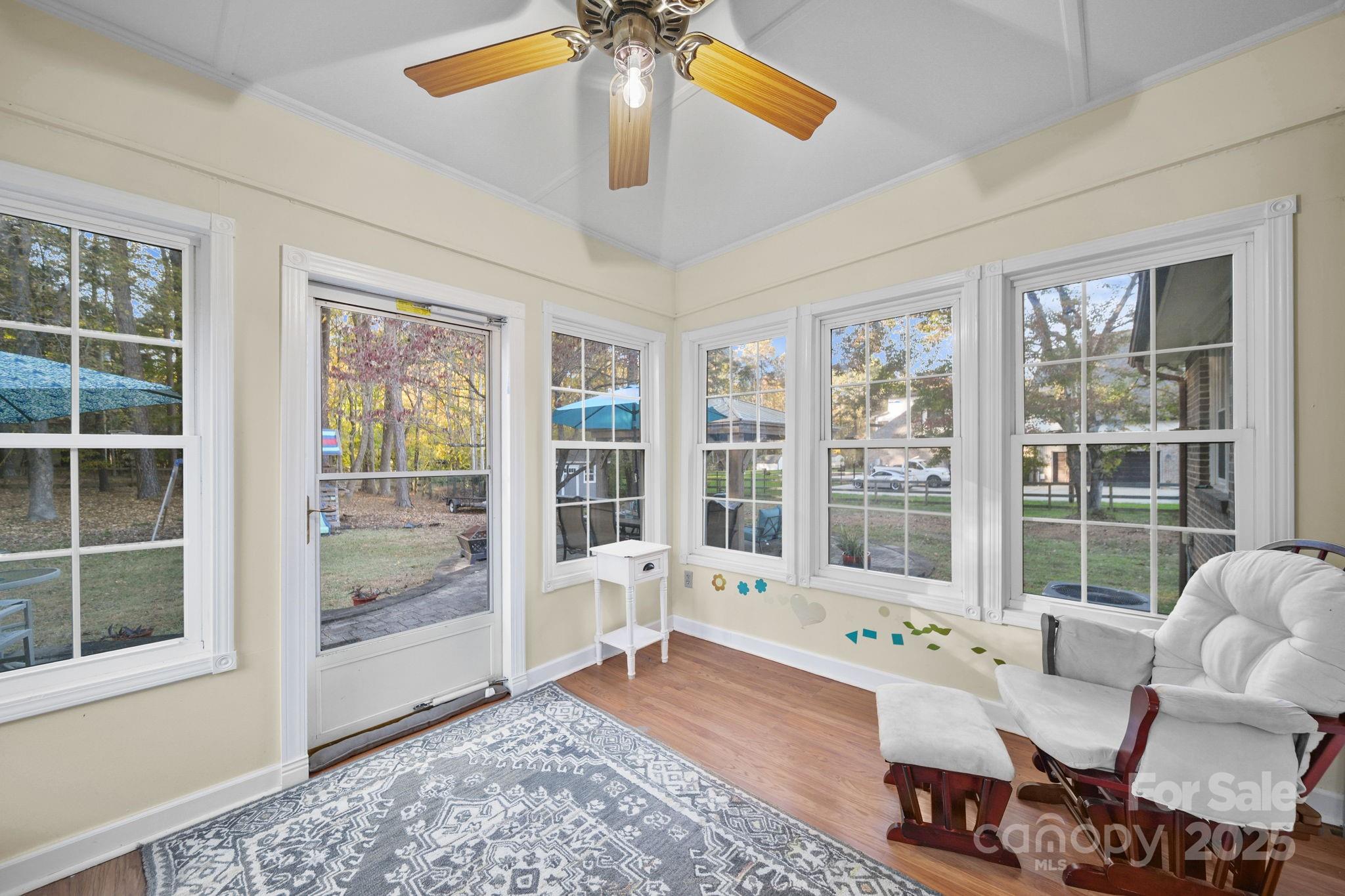 4724 Weddington Matthews Road Matthews, NC 28104 - Photo 29 of 42 a living room with furniture and a large window