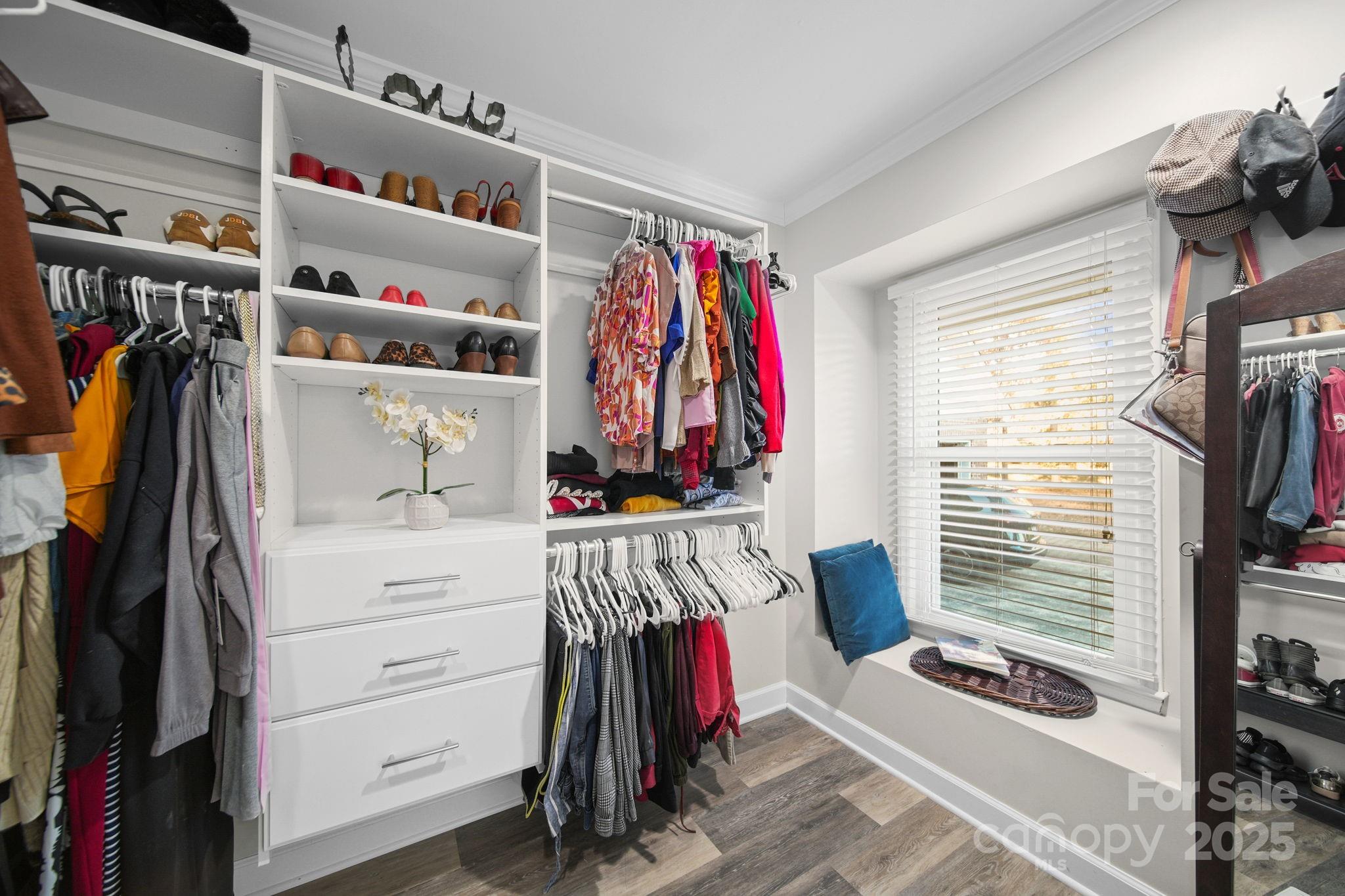 4724 Weddington Matthews Road Matthews, NC 28104 - Photo 32 of 42 a view of walk in closet with clothes and shoes