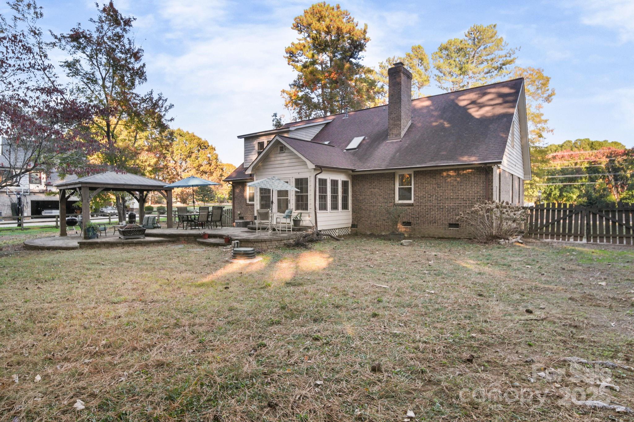 4724 Weddington Matthews Road Matthews, NC 28104 - Photo 38 of 42 a view of house with yard in front of it