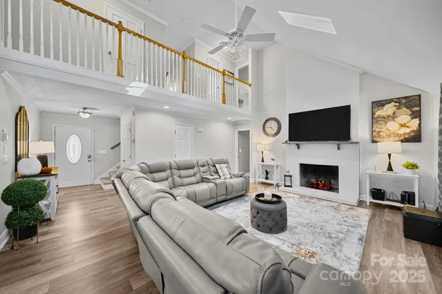 a spacious bathroom with a double vanity sink a mirror a bathtub and