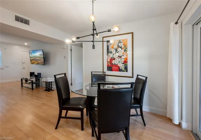 a view of a dining room with furniture
