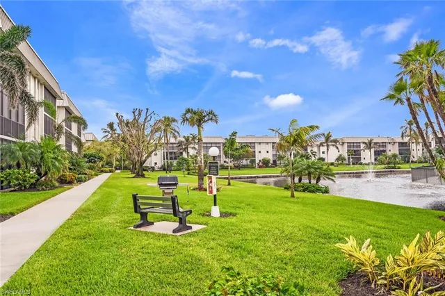 a view of a play ground in front of the house
