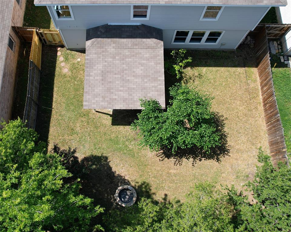 3437 Caprock Ranch Road Fort Worth, TX 76262 - Photo 26 of 27 an aerial view of a house with a yard