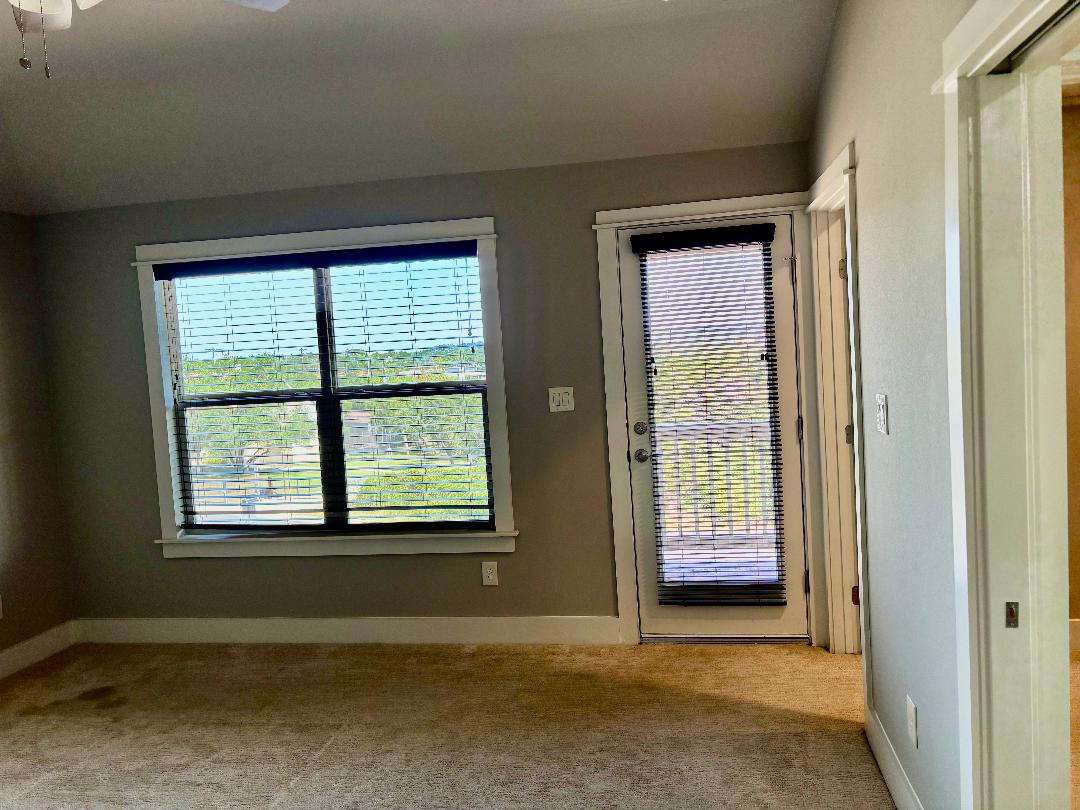 Undisclosed Address Dripping Springs, TX 78620 - Photo 14 of 19 Large windows, private access to front balcony. Very spacious.