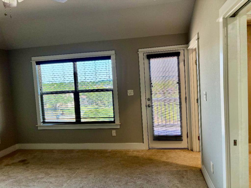 Undisclosed Address Dripping Springs, TX 78620 - Photo 14 of 19 Large windows, private access to front balcony. Very spacious.