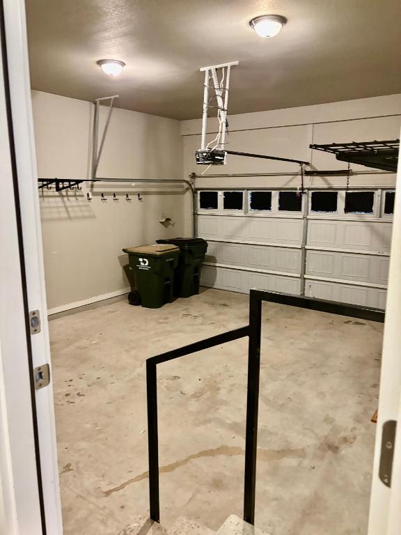 Undisclosed Address Dripping Springs, TX 78620 - Photo 18 of 19 2 Car Garage featuring single door. Added to the garage are strong built in shelving.