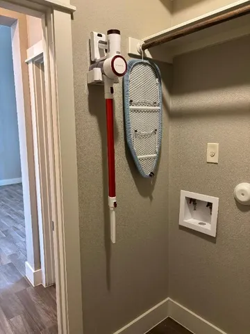 a bathroom with a mirror and a shower