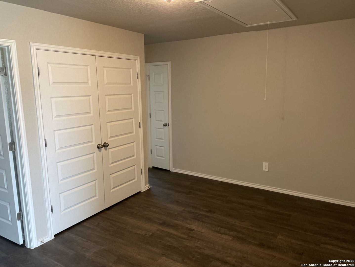 13128 Candace Way St. Hedwig, TX 78152 - Photo 5 of 14 an empty room with wooden floor