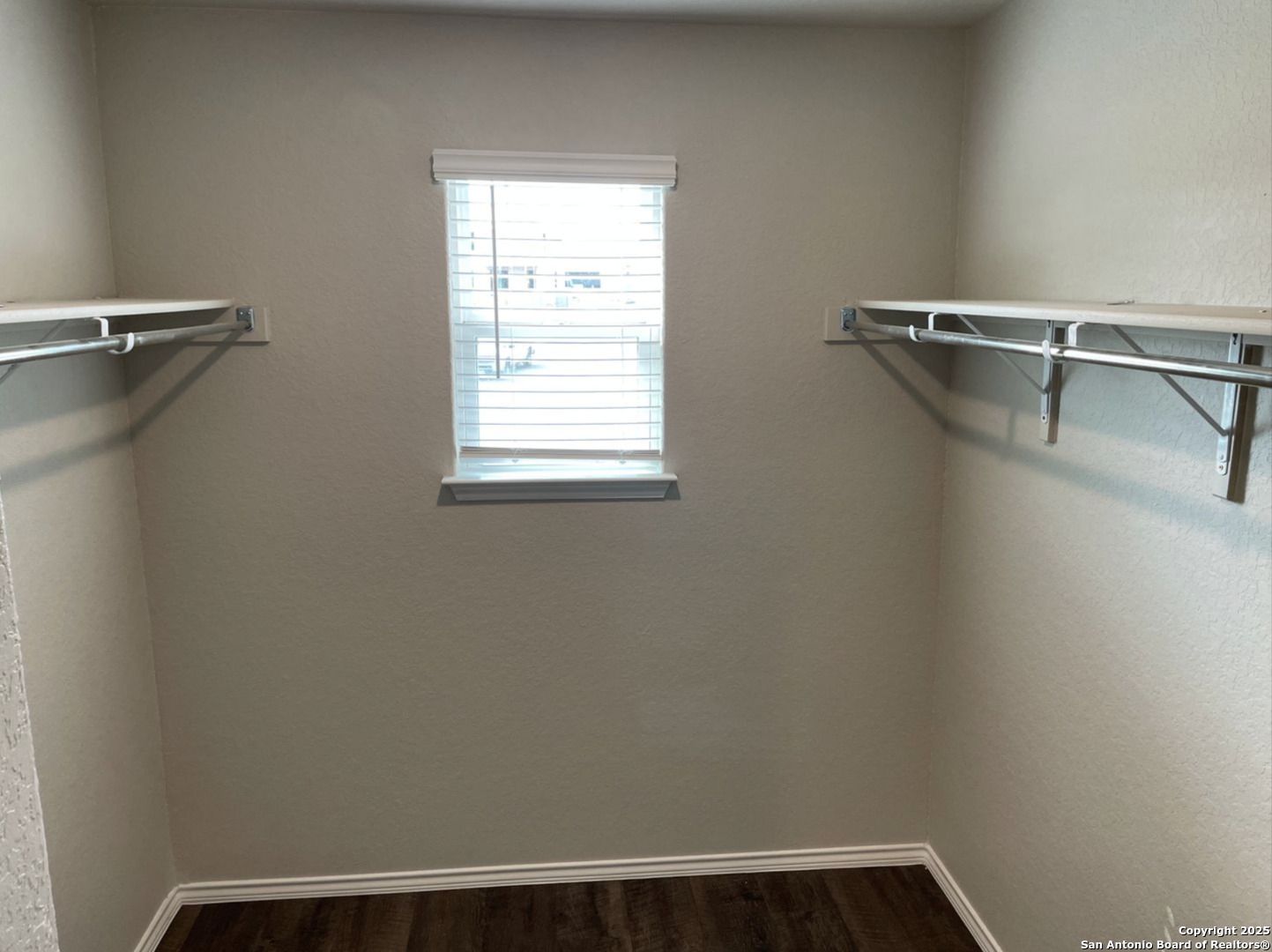 13128 Candace Way St. Hedwig, TX 78152 - Photo 10 of 14 a view of a room with racks on the wall