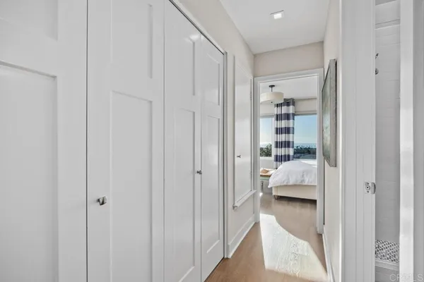 a view of a bedroom with a bed and closet