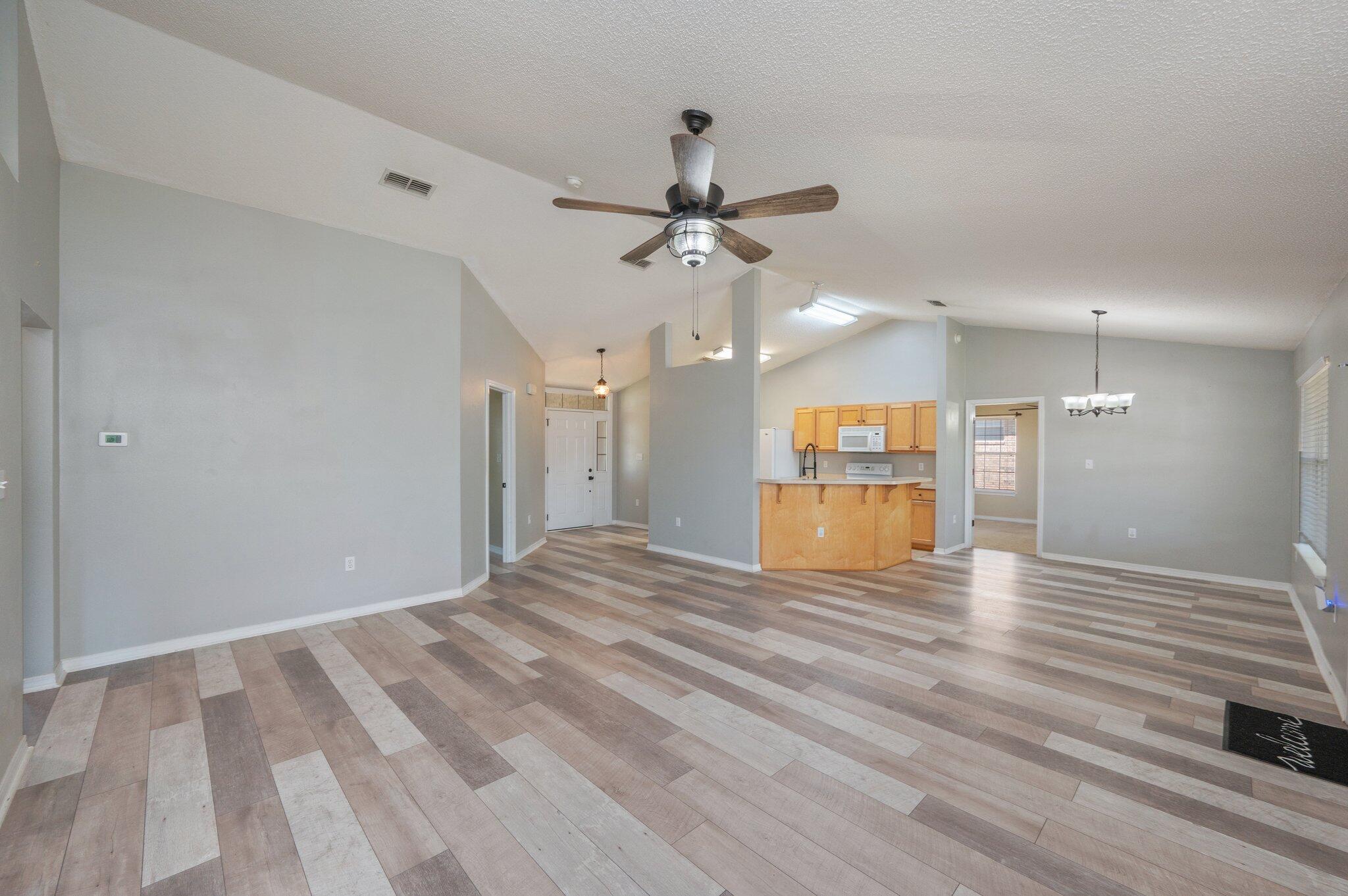 208 Citadel Lane Crestview, FL 32539 - Photo 1 of 27 a view of an empty room with a kitchen