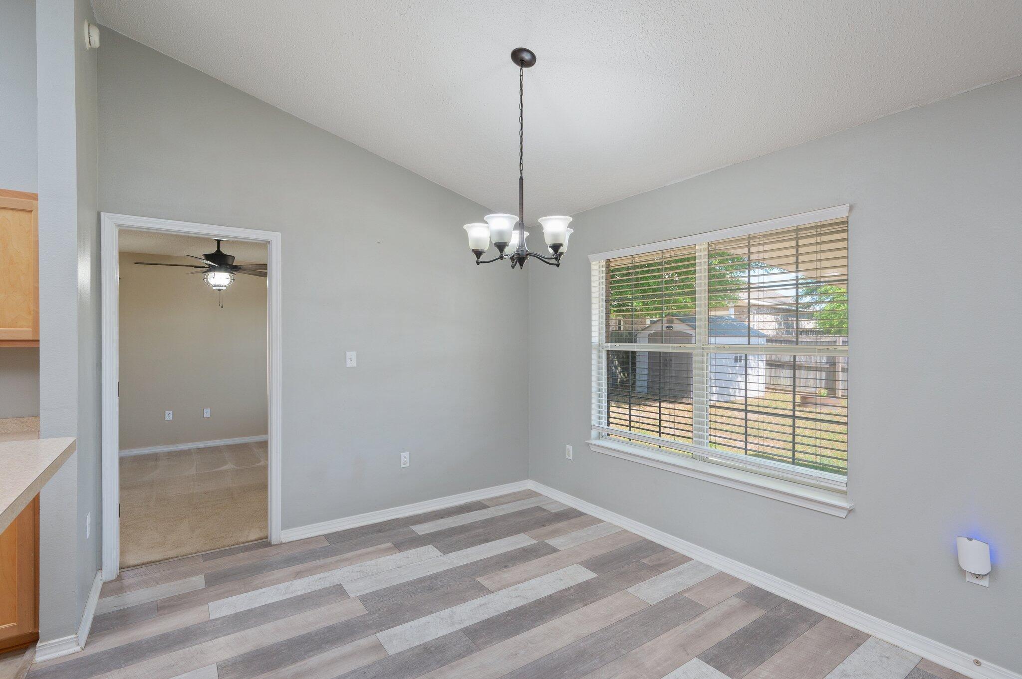 208 Citadel Lane Crestview, FL 32539 - Photo 16 of 27 a view of a room with windows and ceiling fan