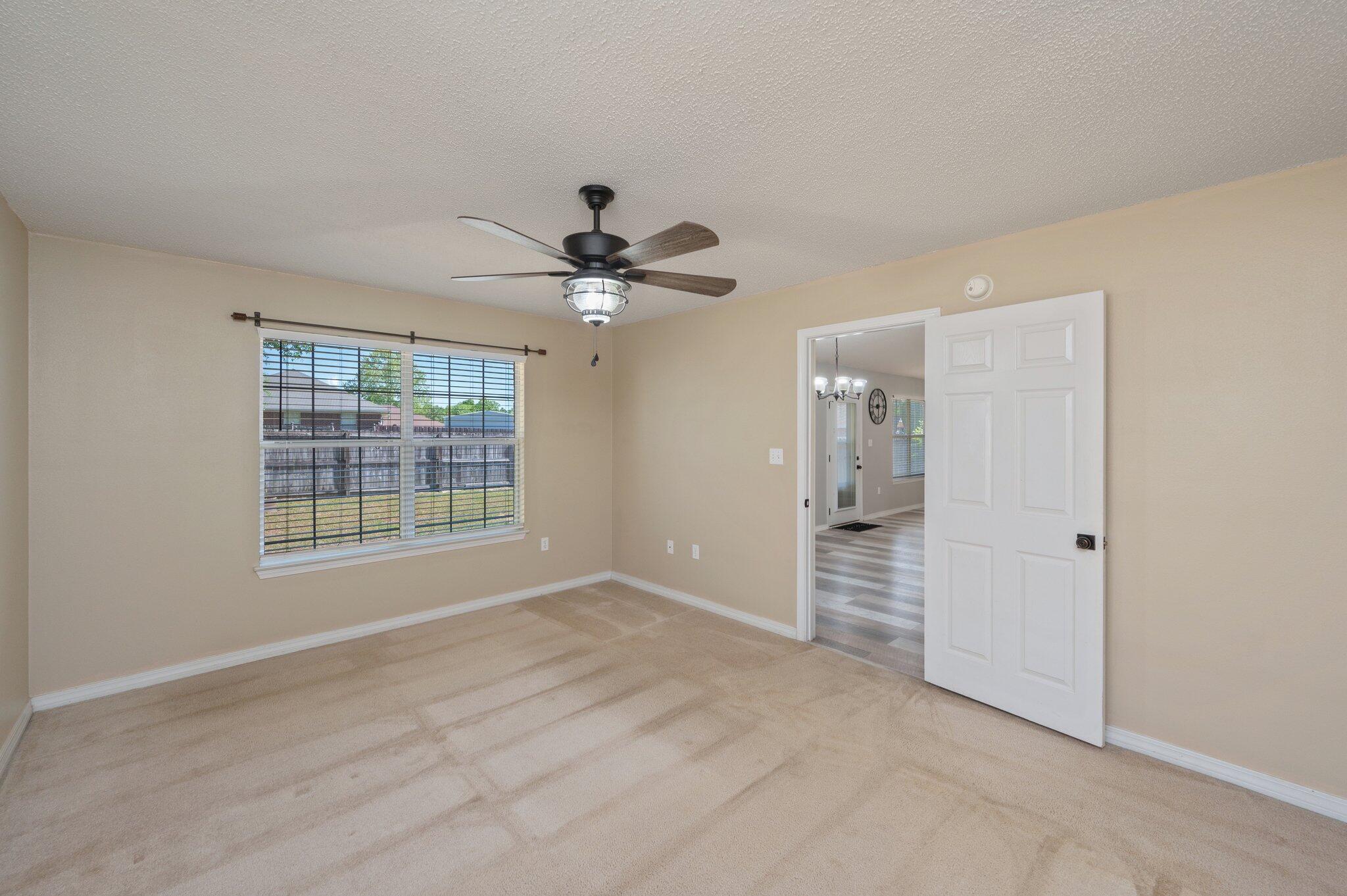 208 Citadel Lane Crestview, FL 32539 - Photo 25 of 27 a view of an empty room with a window