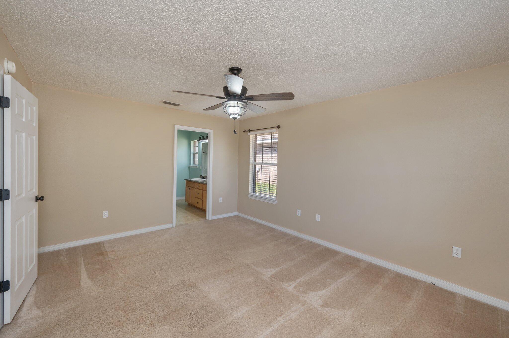 208 Citadel Lane Crestview, FL 32539 - Photo 26 of 27 a view of an empty room with a window