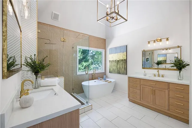 a bedroom with bed and wooden floor