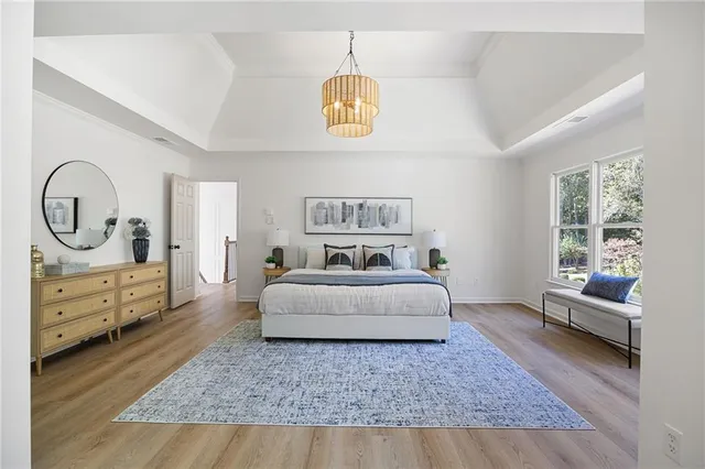 a bath tub sitting in a bathroom next to a window