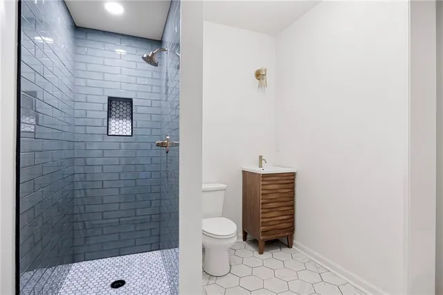 a view of a house with swimming pool and sitting area