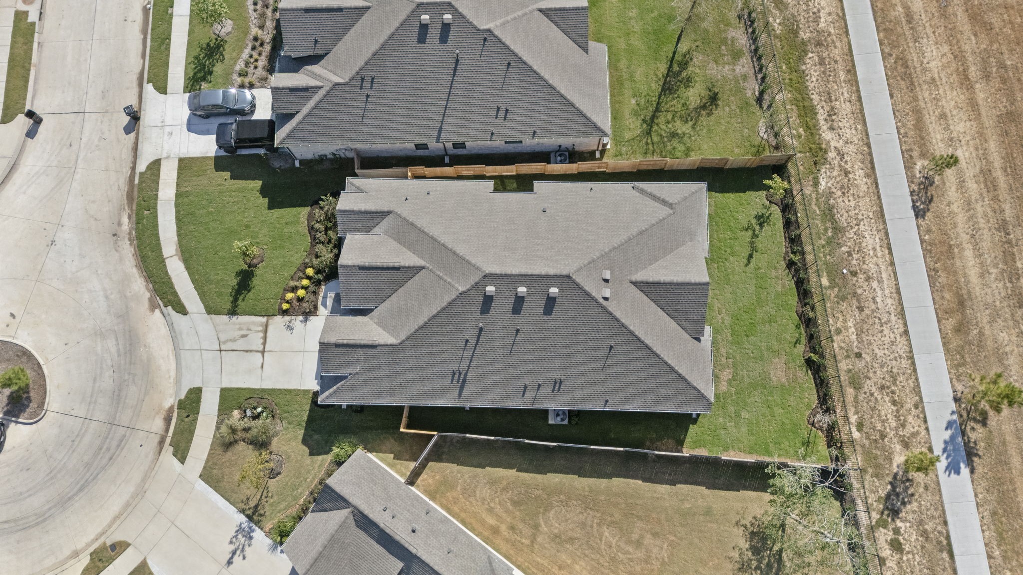 15508 Leopard Lily Lane Conroe, TX 77302 - Photo 21 of 39 an aerial view of a house with a yard