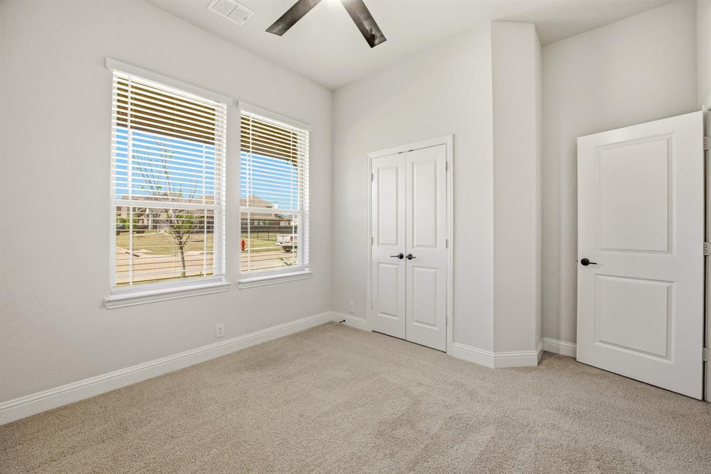 800 Jaguar Ridge Godley, TX 76044 - Photo 16 of 23 an empty room with windows