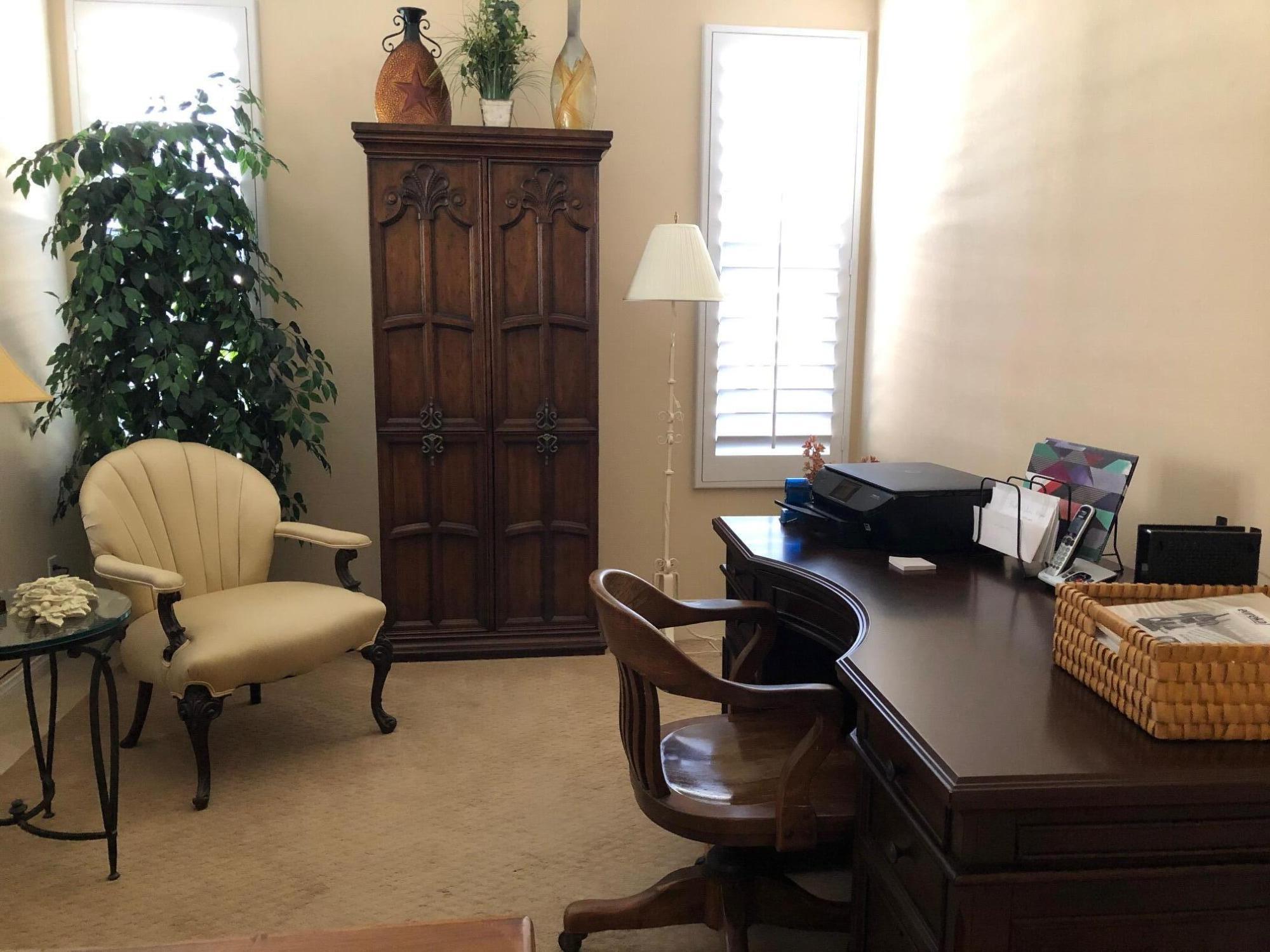 81565 Rustic Canyon Drive La Quinta, CA 92253 - Photo 11 of 12 a living room with furniture and a potted plant